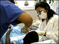 Dentist checking a patient